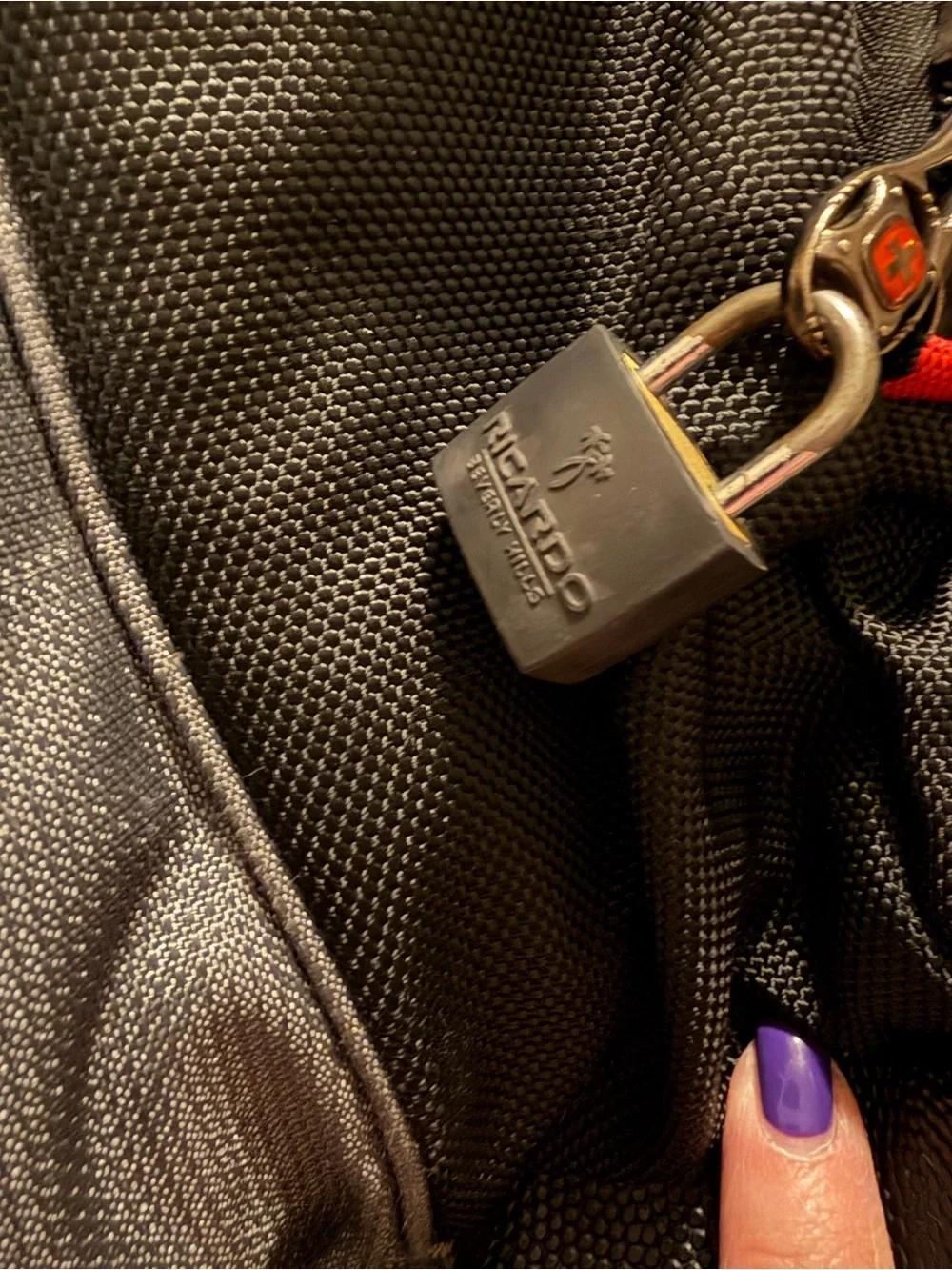 SwissGear Black and Gray Backpack with Red Accents
